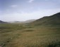 Landscape Images from mongola, depicting rolling green hills